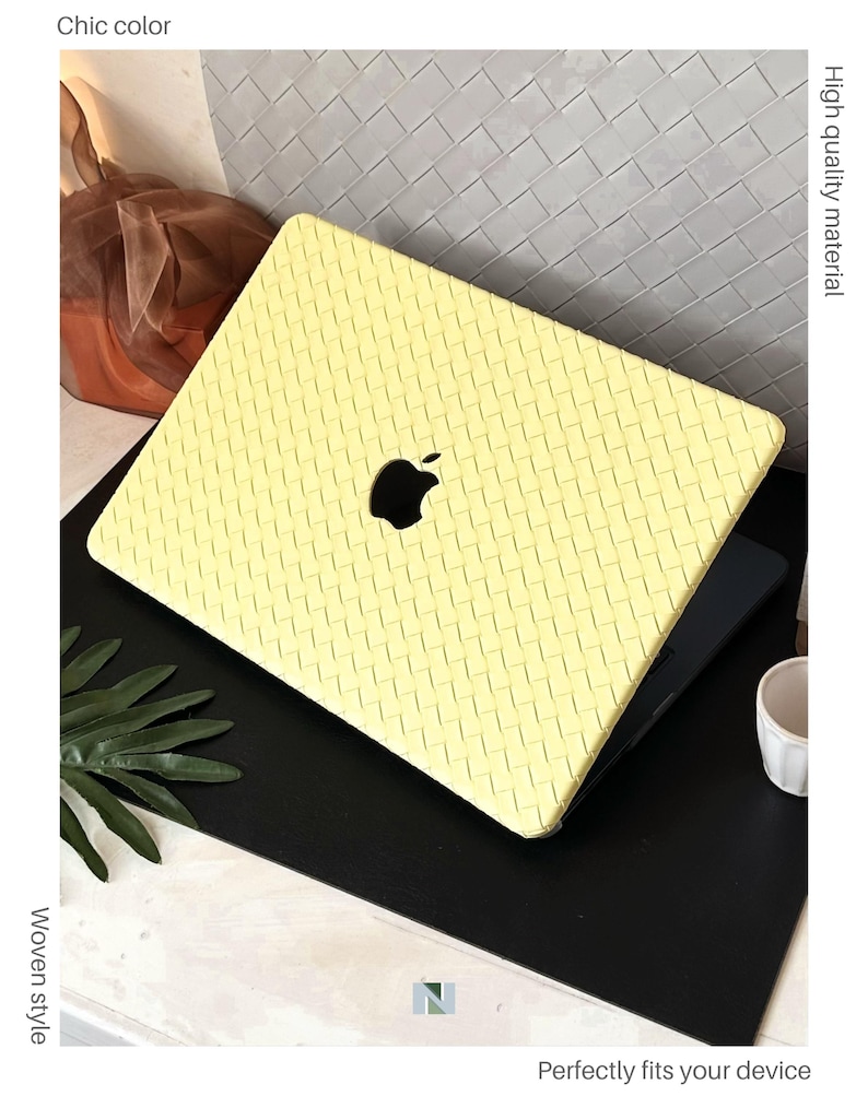 May include: A pale yellow laptop case featuring a textured, woven-style pattern across the entire surface. The case includes a central cutout revealing the black Apple logo. The text on the image reads Chic colour, High quality material, Woven style, and Perfectly fits your device.