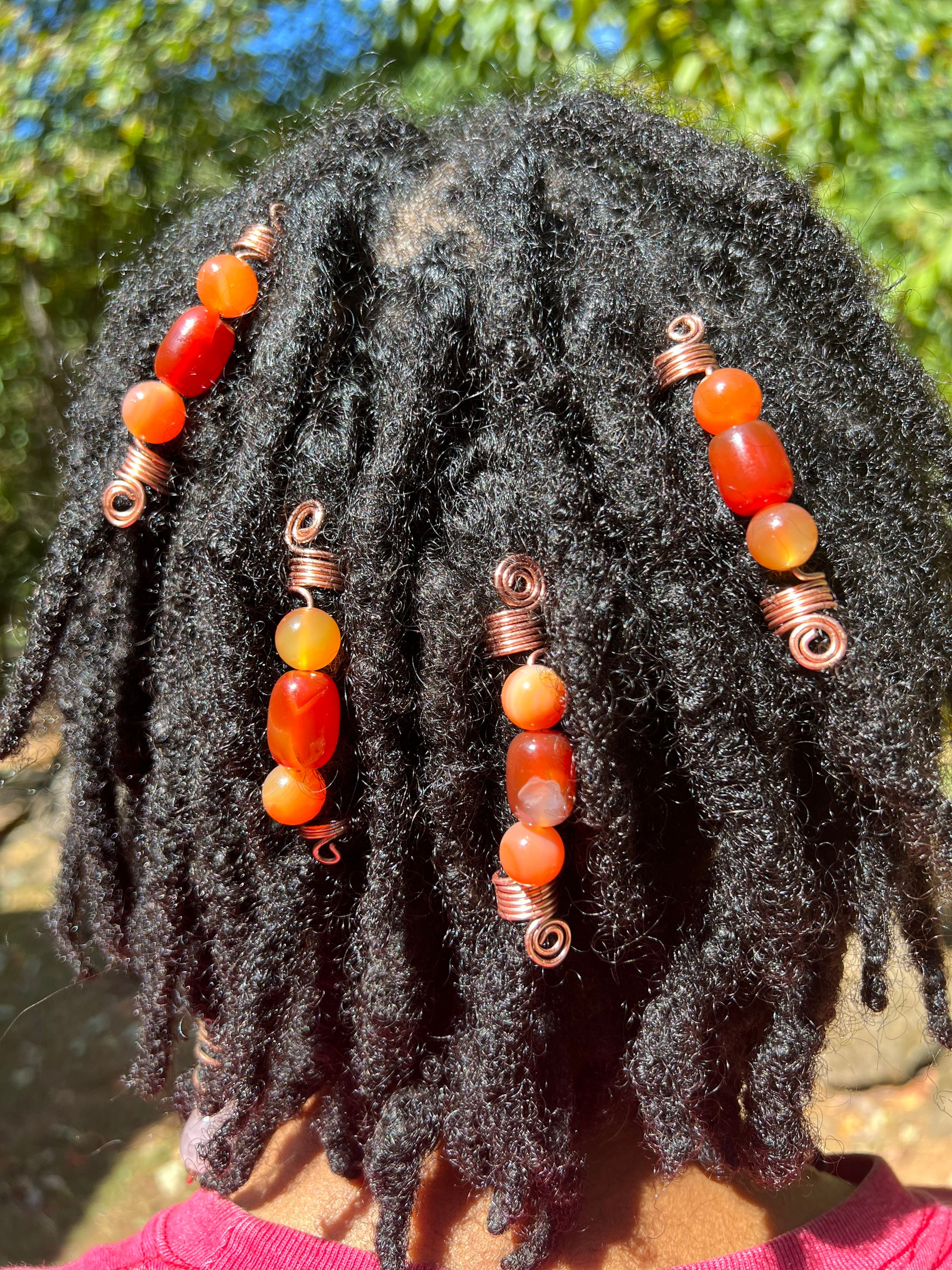 First post came out weird:: I love adding loc accessories to change my look  up a bit. What accessories do yall add? I love the beads and shells :  r/Dreadlocks
