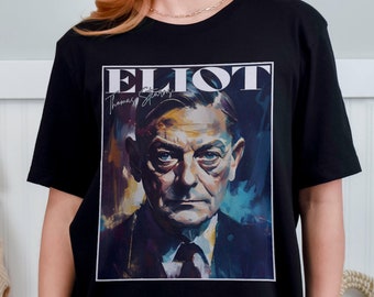 Könnte beinhalten: Schwarzes T-Shirt mit einem farbenfrohen Porträt von T.S. Eliot und dem Text "ELIOT" in weißen Buchstaben.