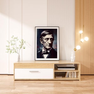 Puede incluir: Un mueble de TV de madera clara con un caj&oacute;n blanco y estantes abiertos. Un retrato enmarcado de un hombre con un traje oscuro y corbata de lazo cuelga sobre el mueble. Un peque&ntilde;o objeto decorativo se encuentra en el estante superior.