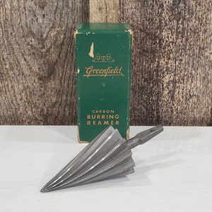Burring reamer outlet