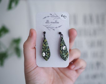 Black patterned floral clay earrings