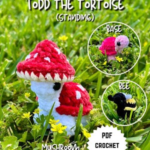 May include: A crochet mushroom-shaped tortoise with a red and white spotted cap, white body, and a red shell. The image includes a smaller pink tortoise and a black and yellow bee. Text reads "Todd the Tortoise (Standing)" and "Mushroom".