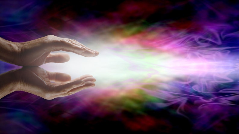 May include: Two hands cupped together with a bright white light emanating from between them. The background is a swirling mix of purple, pink, and blue.