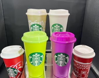 Starbucks travel mugs discontinued or rare color.  Never been used.  2013.