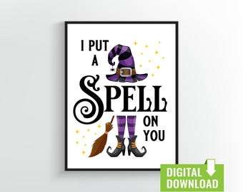 May include: A printable Halloween sign with a witch wearing a purple and black hat and holding a broom. The text reads "I put a spell on you".