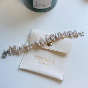 Biwa Baroque Pearl Bracelet: Sterling Silver Chain, Keshi Pearls