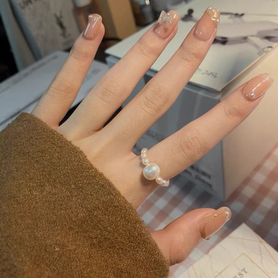 Mini shop pearl ring