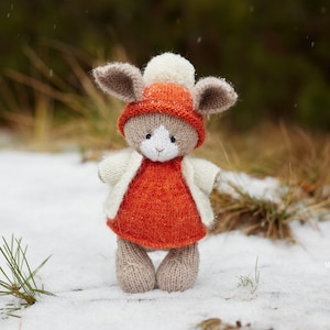 Knitted bunny doll, stuffed bunny toy with clothes, Christmas gift for animal toy lover. Cute rabbit toy for nursery decor, holidays gift.