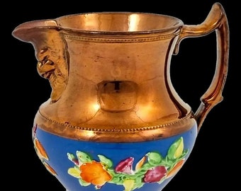 1840’s pottery copper lustreware small wine jug with Bacchus mask and floral sprays