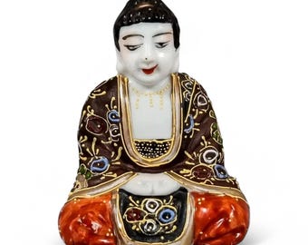 Meiji Japanese Kutani porcelain sitting Buddha figurine, enamel moriage by Dai Nippon Tsukuru