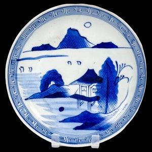 Antique Japanese Meiji era Arita blue and white plate with mountains and trees