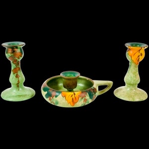 Studio Pottery green chamberstick and 2 matching candlesticks decorated with autumn oak leaves