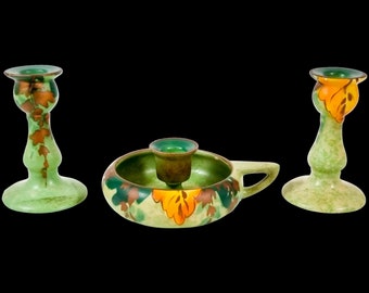 Studio Pottery green chamberstick and 2 matching candlesticks decorated with autumn oak leaves