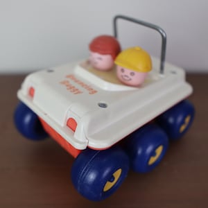 Vintage 1973 Fisher Price Bouncy Buggy - Hecho en EE. UU.