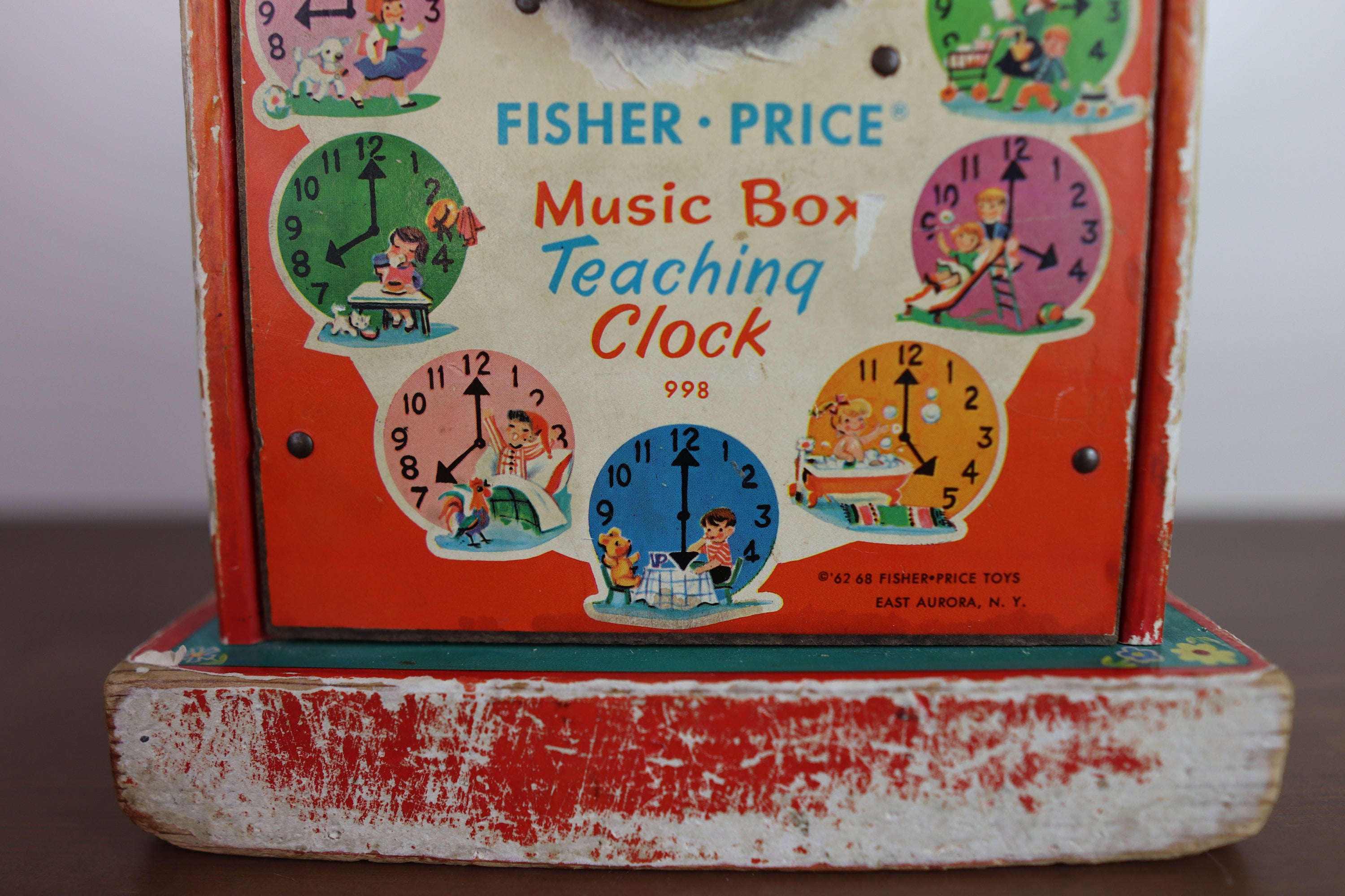 Fisher price music box hotsell teaching clock 998 value