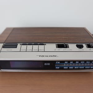 Classic Vintage 1980s Realistic Brand Chronomatic 253 Digital Clock Radio with Alarm with Faux Woodgrain Top
