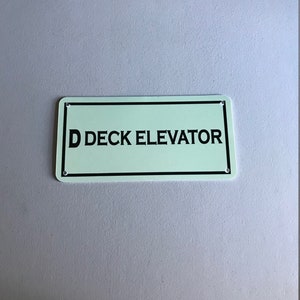RMS Titanic D-Deck Elevator Sign Replica | White Star Line Heavy Plastic Vintage Ship Decor | Maritime Collectible for Man Cave or She Shed