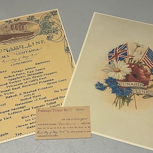 May include: Vintage Cunard Line ephemera, including a luncheon menu from the R.M.S. Lusitania, a floral print with British and American flags, and a passage ticket. The menu lists various dishes.