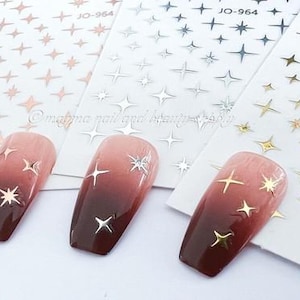 Gold Stern-Nagel-Aufkleber: Glänzendes hohles Kreuz-Design