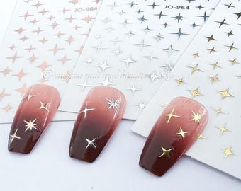 ゴールドスターネイルステッカー：光沢のある中空クロスデザイン