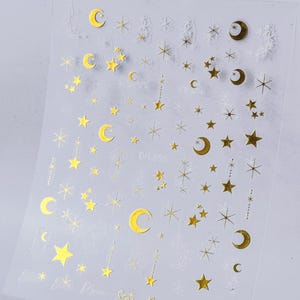 Nagel-Aufkleber Weiß Gold Sterne / Mond glänzend Maniküre Kunst-Werkzeuge