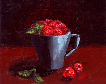 May include: An oil painting depicts a gray mug overflowing with bright red raspberries, accented by green mint leaves. Two loose raspberries and mint leaves rest on the red surface. The background is a dark red, with the artist's signature and the year 2022.