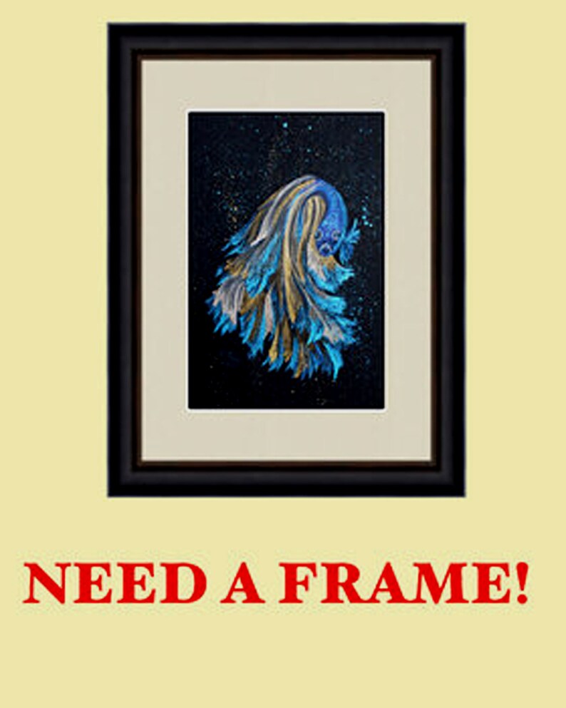 May include: Framed artwork featuring a blue and gold betta fish against a black background with gold flecks. The artwork is in a black frame with a cream-colored mat. The text "NEED A FRAME!" is displayed below the frame.