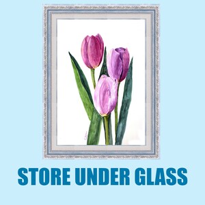 May include: Watercolor painting of three tulips in shades of pink and purple, with green leaves, framed in a silver and blue ornate frame. The text "STORE UNDER GLASS" is displayed below the frame.