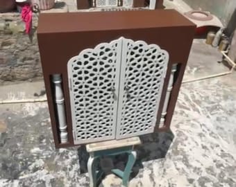 Divine Hindu Mandir with doors.