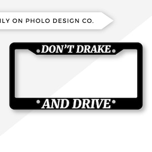 May include: Black license plate frame with white text that reads "Don't Drake and Drive."