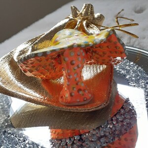 Orange yellow and gold painted air clay Toadstool