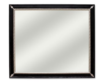 Rectangular wall mirror with black lacquered wooden frame and with silver details