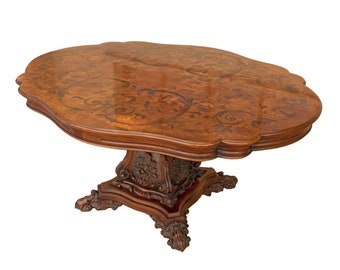 Antique oval dining table in baroque style