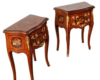 A Pair of Louis XV style bedside tables