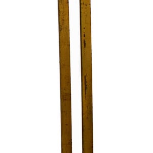 May include: Two vintage, rectangular, yellow metal table legs with a distressed finish. The legs are straight and have a flat top and bottom, suitable for furniture construction or restoration projects.