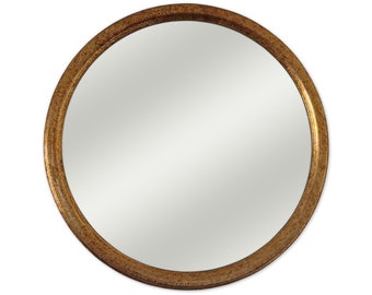 Round wall mirror with gilded wood frame with gold leaf