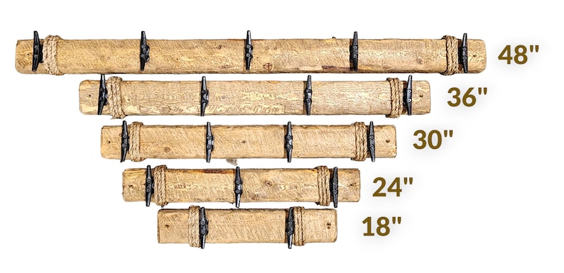 Solid wood nautical theme style look wall mounted coat or towel rack for the bathroom or entryway. This coastal themed towel hooh has rust proof black cast iron boat dock cleats or deck hooks. the wood is distressed and aged with the look of driftwood or reclaimed wood.