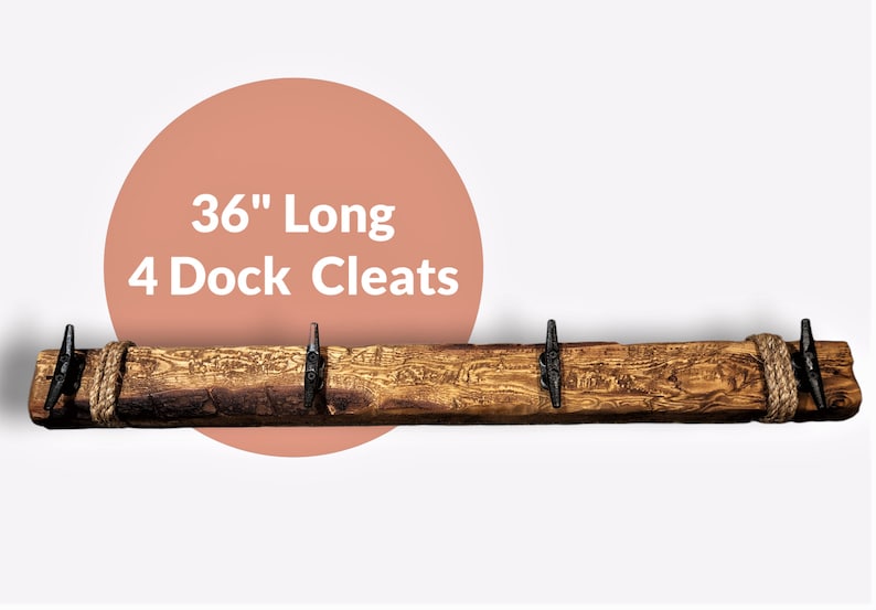 Solid wood nautical theme style look wall mounted coat or towel rack for the bathroom or entryway. This coastal themed towel hooh has rust proof black cast iron boat dock cleats or deck hooks. the wood is distressed and aged with the look of driftwood or reclaimed wood.