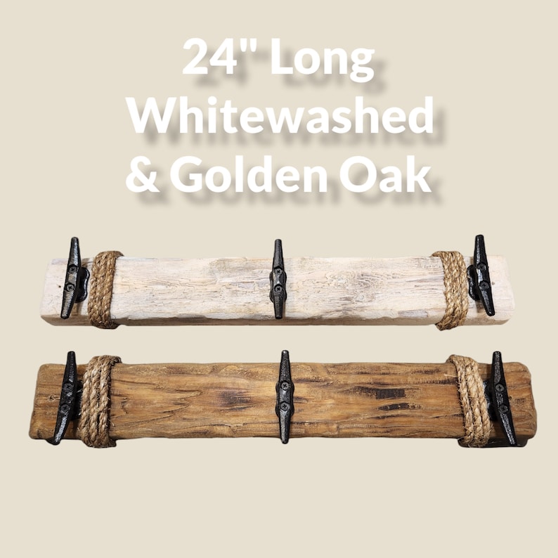 Solid wood nautical theme style look wall mounted coat or towel rack for the bathroom or entryway. This coastal themed towel hooh has rust proof black cast iron boat dock cleats or deck hooks. the wood is distressed and aged with the look of driftwood or reclaimed wood.