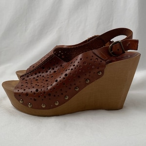 Sz 6.5 | Vintage leather platform wedge slides with perforated leather and brass stud detail