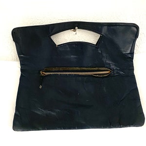 Vintage 60s navy blue leather purse with butterfly detail, striped cotton lining