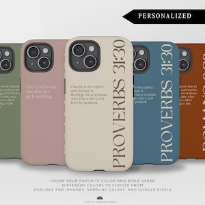 May include: A selection of mobile phone cases in various colours, each displaying a different Bible verse. The cases are in shades of green, pink, beige, blue, and brown. The text "PROVERBS 31:30" and "ROMANS 8:28" are visible. Cases are available for iPhones, Samsung Galaxy, and Google Pixels.