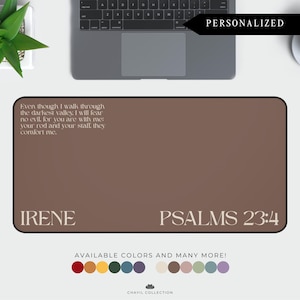 May include: Personalized brown desk mat with the text "Even though I walk through the darkest valley, I will fear no evil for you are with me. Your rod and your staff, they comfort me."  The mat also includes the text "IRENE" and "PSALMS 23:4".  The mat is available in a variety of colors.