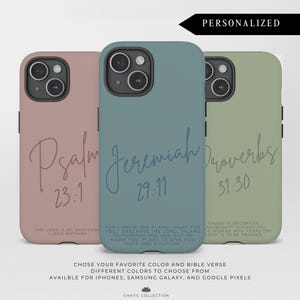 May include: Three phone cases in pastel colors: pink, teal, and green. Each case has a different Bible verse in a cursive font. The cases are for iPhones, Samsung Galaxy, and Google Pixel phones. The word "PERSONALIZED" is at the top.