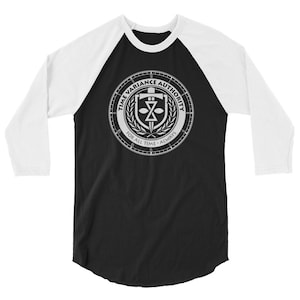 May include: A black and white baseball style t-shirt with a white graphic of a clock face with the words "Time Variance Authority" and "For All Time - Always" around the edge.