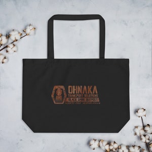 May include: Black tote bag with a brown logo that says "Ohnaka Transport Solutions Black Spire Outpost".
