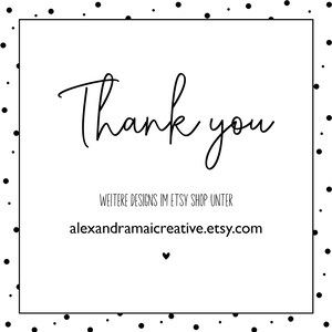May include: A white card with black text that says "Thank you" and "WEITERE DESIGNS IM ETSY SHOP UNTER alexandramaicreative.etsy.com". A small black heart is below the text.