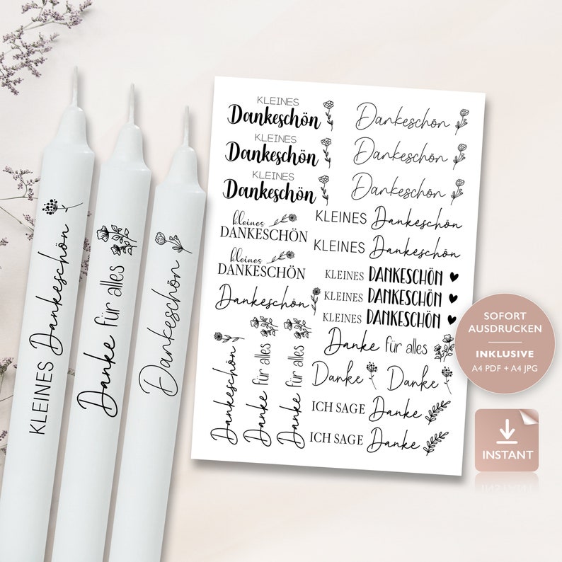 May include: Three white candles with black text that reads "KLEINES Dankesch&ouml;n", "Danke f&uuml;r alles", and "Dankesch&ouml;n".  A sheet of printable stickers with various designs featuring the text "KLEINES Dankesch&ouml;n", "DANKESCH&Ouml;N", "Danke f&uuml;r alles", "Danke", and "ICH SAGE Danke".