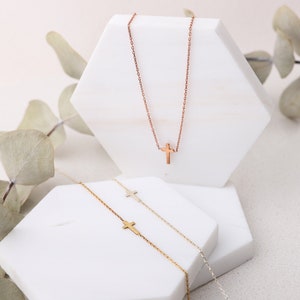CROSS NECKLACE,
SIDEWAYS CROSS NECKLACE,
DAINTY CROSS NECKLACE,
SILVER CROSS NECKLACE.